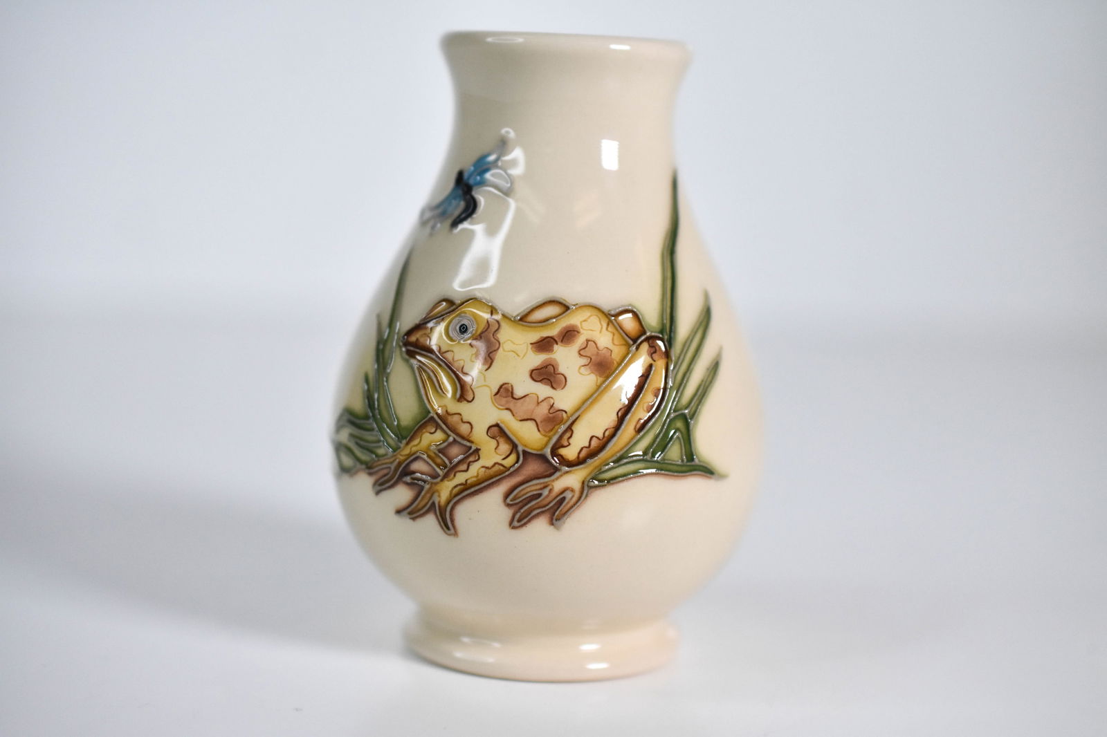 Moorcroft “Frog and Dragonfly?? Vase 2009: "A rare Moorcroft vase designed by Kerry Goodwin, featuring the delightful “Frog and Dragonfly” pattern. The design depicts lively green frogs and elegant dragonflies among reeds and lily