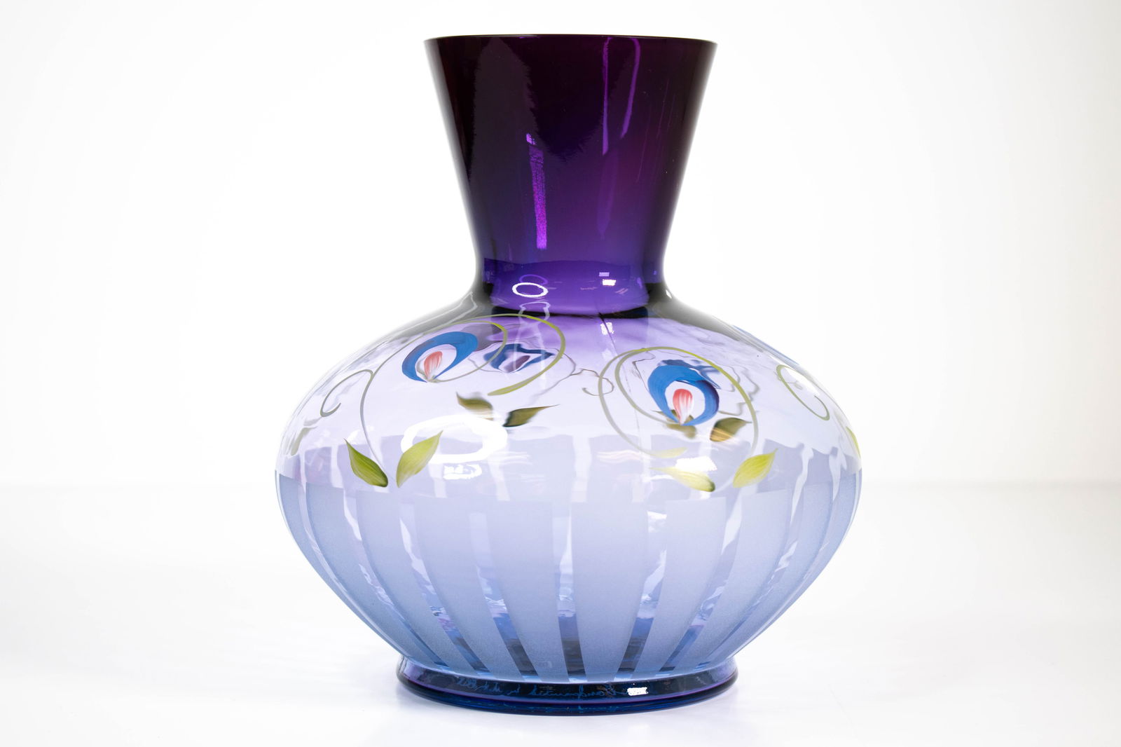 Fenton “Deco Floral on Mulberry?? Vase: Fenton "Deco Floral on Mulberry?? Vase — Hand-Painted Art Glass A striking Fenton Art Glass vase in the “Deco Floral on Mulberry?? pattern, featuring elegant hand-painted blossoms in soft blue and