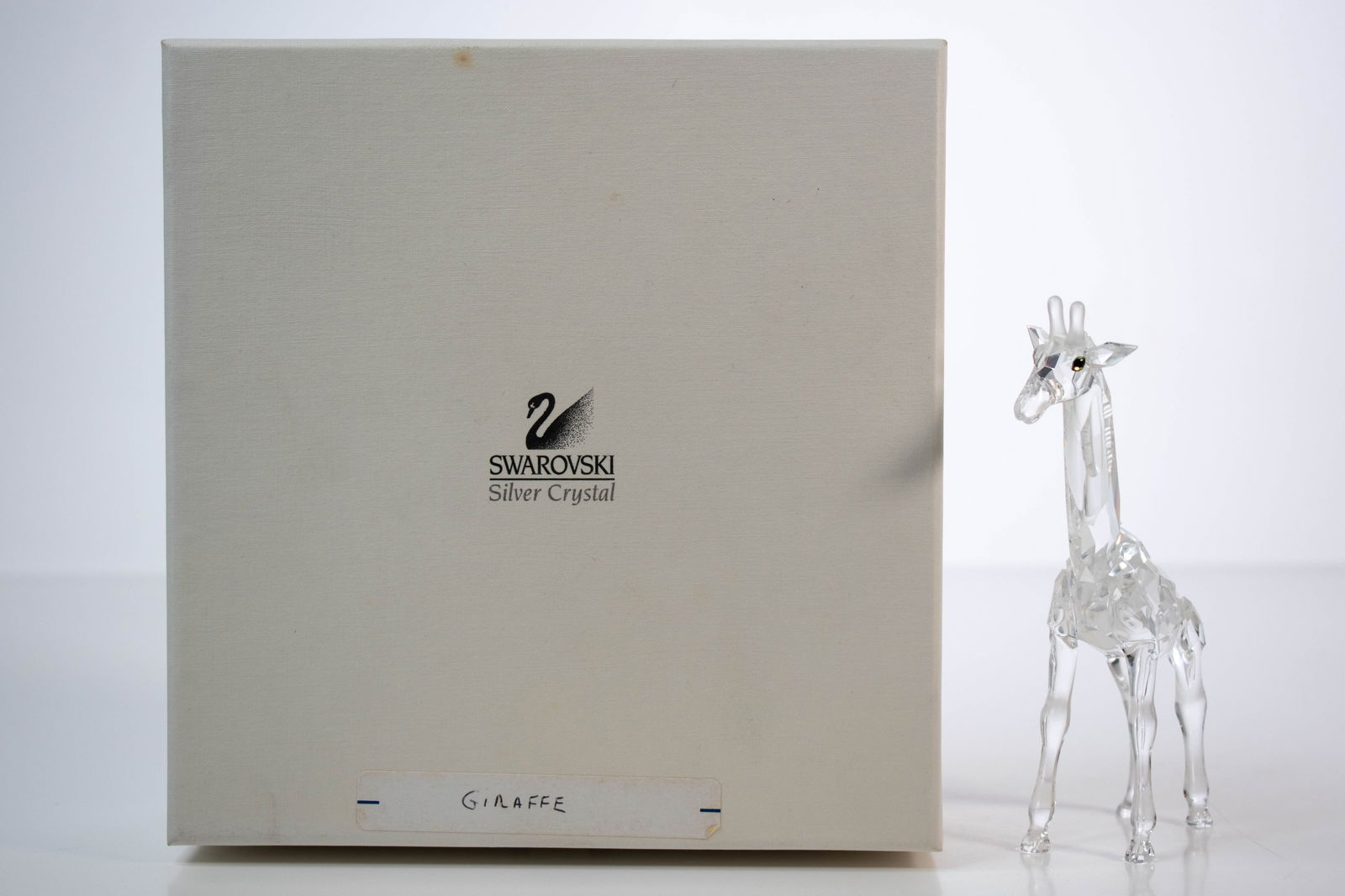 Swarovski Crystal Baby Giraffe Figurine 236717: Swarovski Crystal Baby Giraffe Figurine 236717 a 7603 Nr Austria Approximately 5.5"H ****We Offer In-House Shipping***