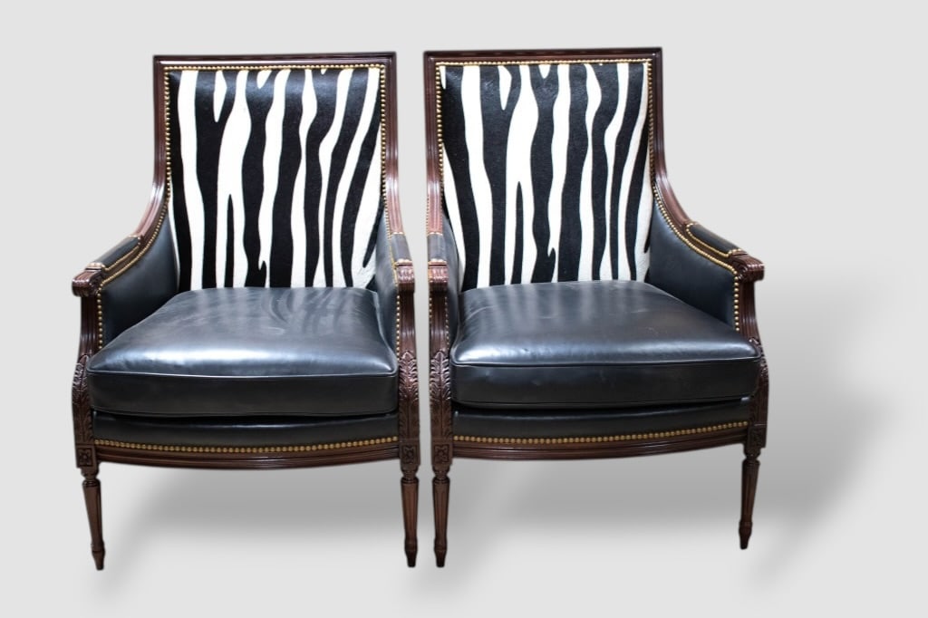 Hancock and Moore Zebra Hide Lounge Chairs: Includes (2), measuring approx. 26.5"w x 31"deep x 38.5"h. Appear to be in great condition, with wear commensurate with age and use. ****We Offer In-House Shipping***