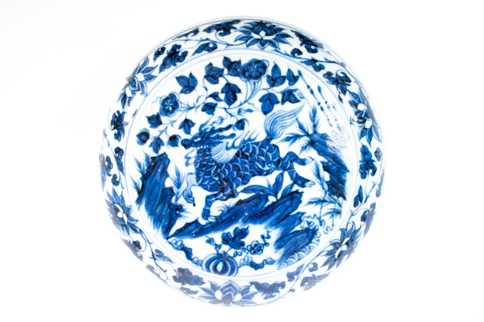 Chinese Porcelain Lidded Xuande Style Fruit box: A nice Chinese (Xuande Period Style) lidded fruit box, the lid decorated with dragon, flowers and other decorations in underglaze blue on white porcelain. Measures 9.5" wide ****We Offer In-House