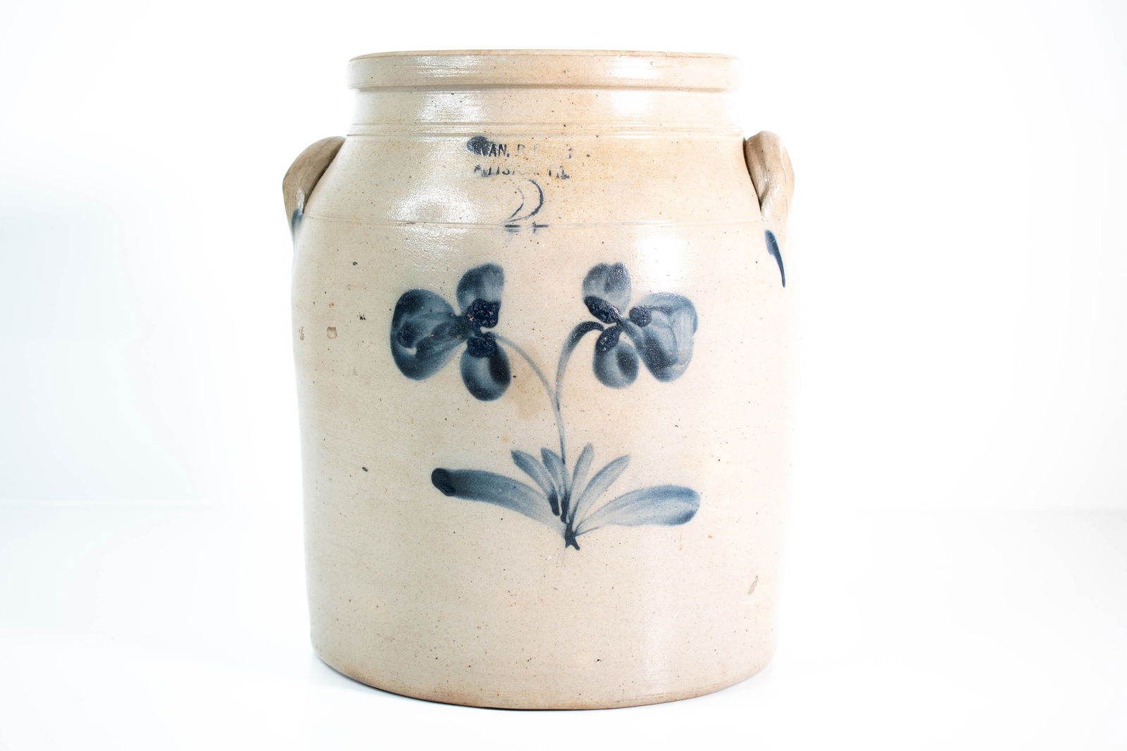 Antique Blue Decorated Stoneware Clover: A fine and antique 2 gallon blue decorated stoneware crock circa 1860-1880. Signed "2" Evan B. Jones Pittston, PA Height 11" ****We Offer In-House Shipping***