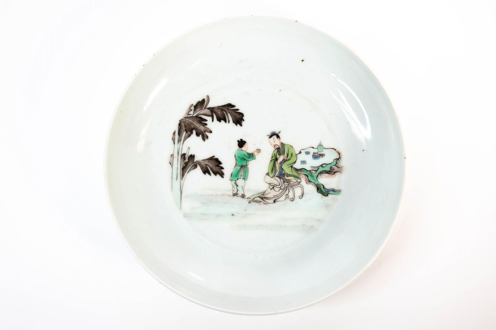 Chinese Porcelain Plate (Xuande): A nice Chinese porcelain plate decorated with a scholar and his pupil or assistant in a colorful palette, the underside with two concentric circles and a six character Xuande seal and mark. Length