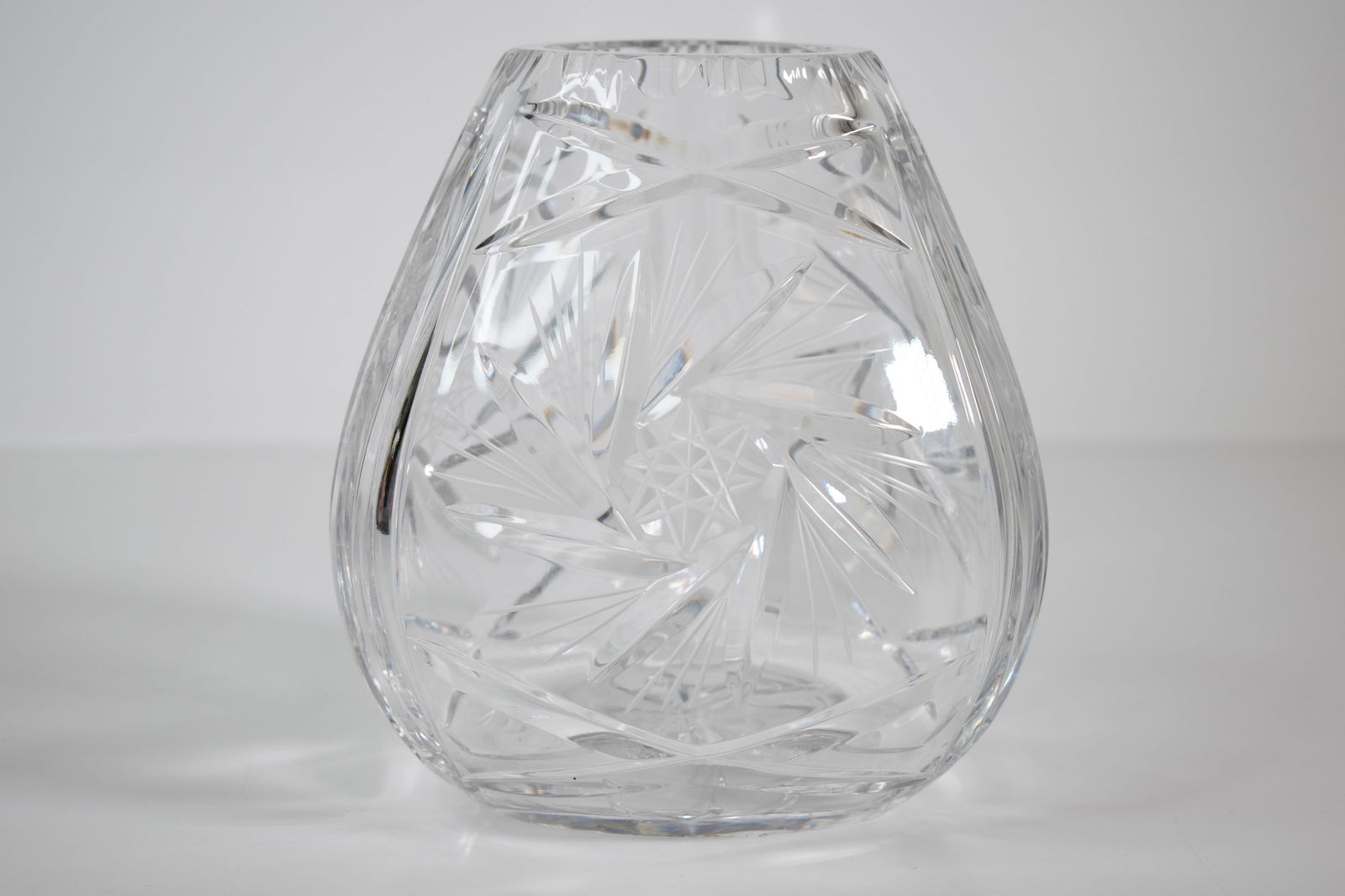 Cut Glass vase: A nicely and brilliantly star cut glass vase. Height 6" ****We Offer In-House Shipping***