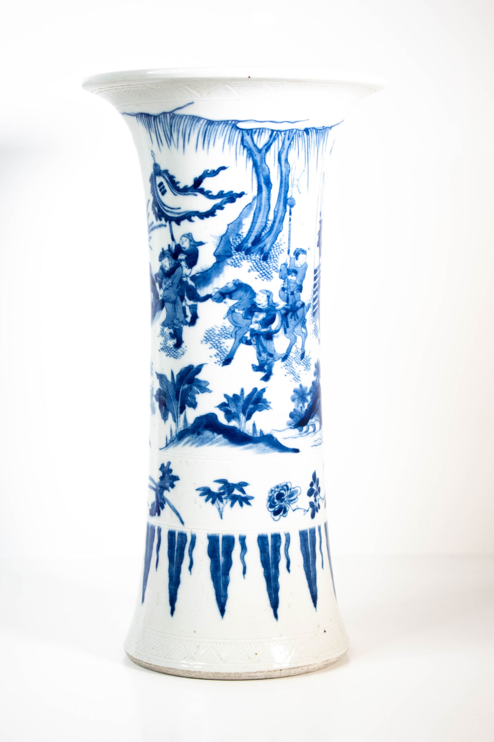 Chinese Qing Blue and White Gu Vase: A fine Chinese vase in Gu Form with blue underglaze figurative subject matter in the Chongzhen style. decorations Height 15.5" ****We Offer In-House Shipping***