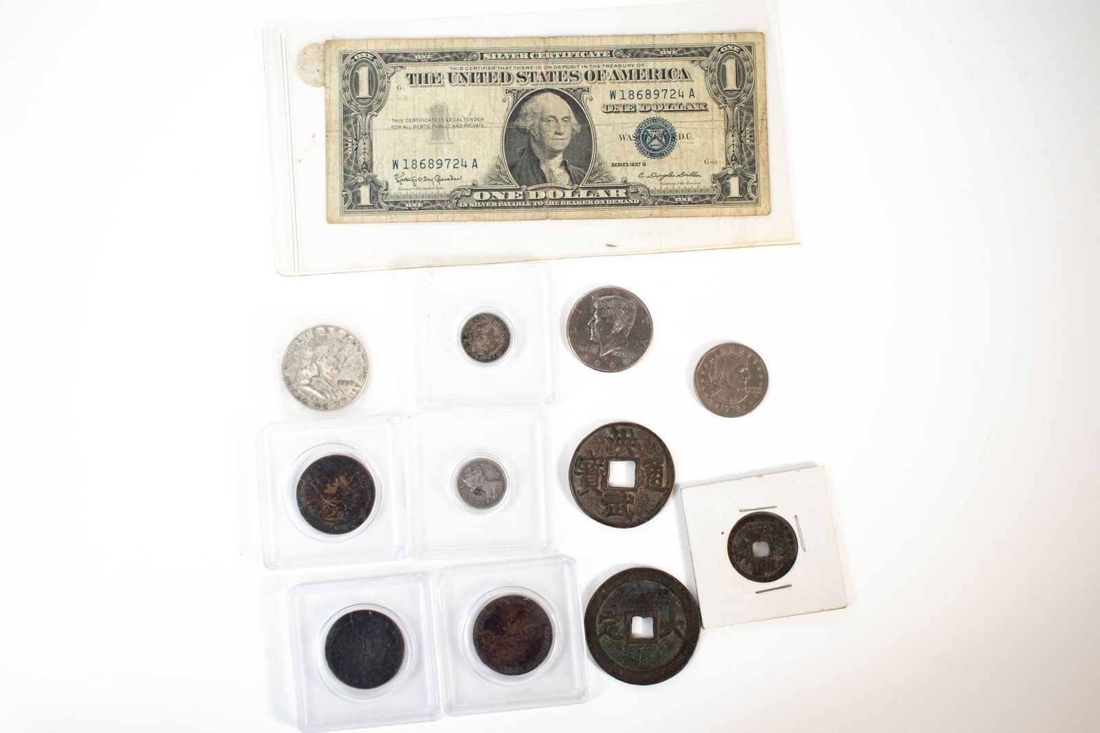 One Dollar Silver Certificate and Foreign Coins: All for one money. ****We Offer In-House Shipping***