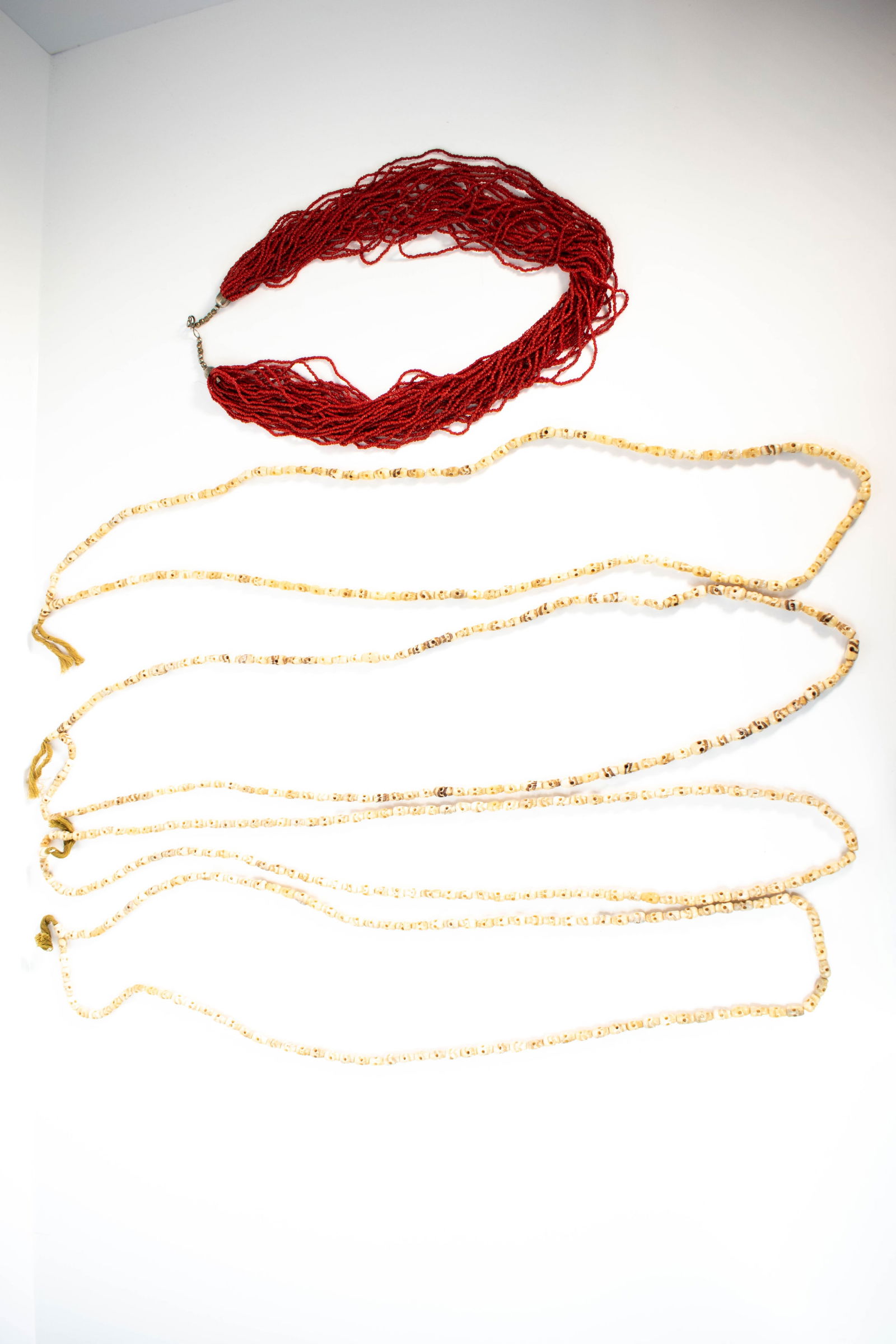 Chinese Carved Bone Skull & Coral Necklaces: Cool Carved bone skull and Coral necklaces. Largest necklace Length 27" ****We Offer In-House Shipping***