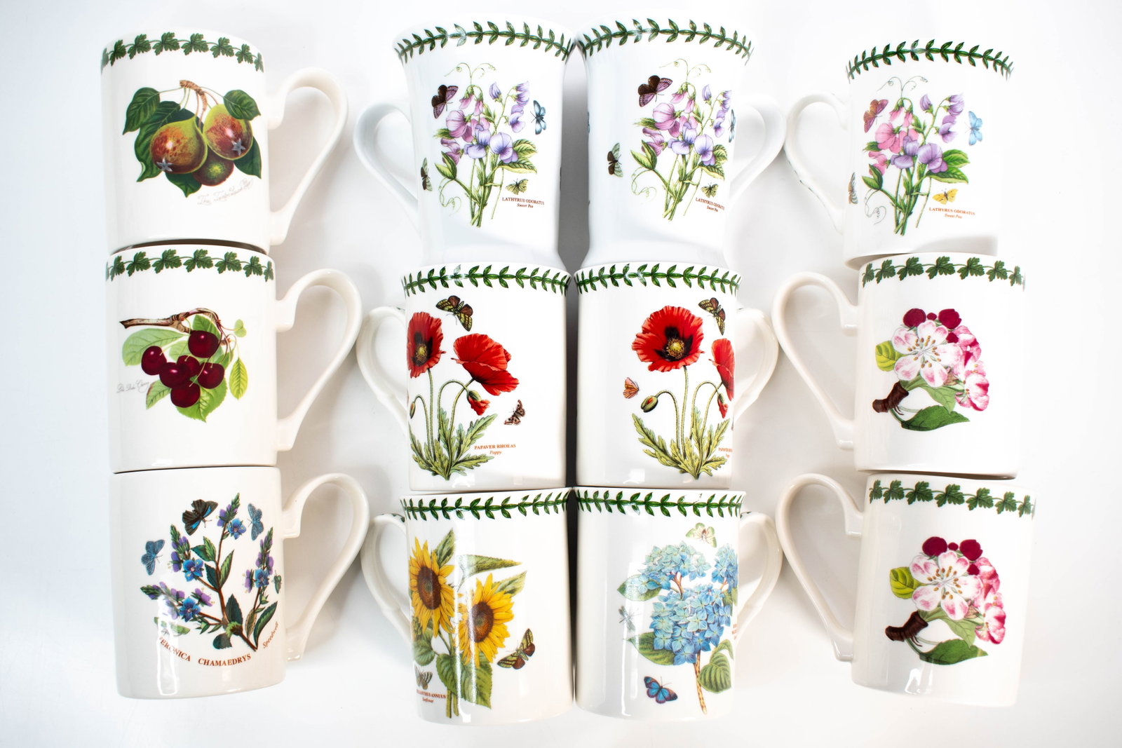 Portmeirion Porcelain Coffee Mugs Collection: Botanic Garden designed porcelain mugs. Largest cup Height: 5" ****We Offer In-House Shipping***