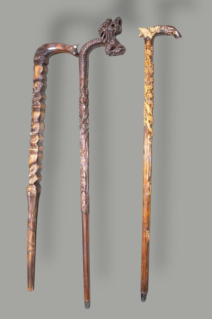 Carved, Asian and African Walking Sticks: All for one money. Largest measures approx. 40"l ****We Offer In-House Shipping***
