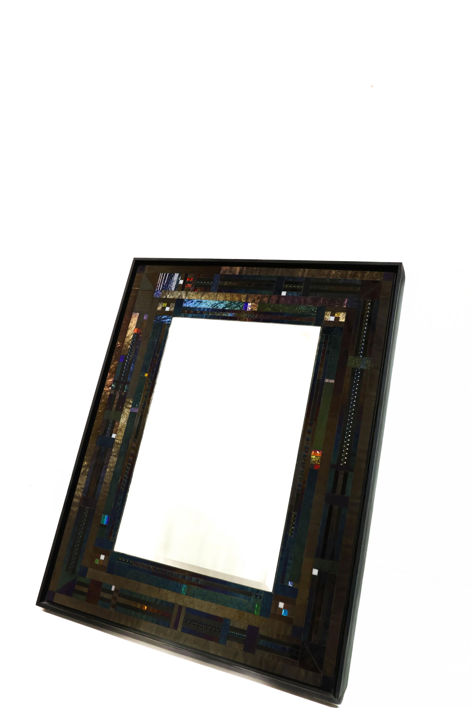 Thomas Meyers Studio Mirror: A very nice decorator style mirror with glass jewels. Signed. Measures 22 in wide 28 in tall with a beveled mirror in its Center ****We Offer In-House Shipping***