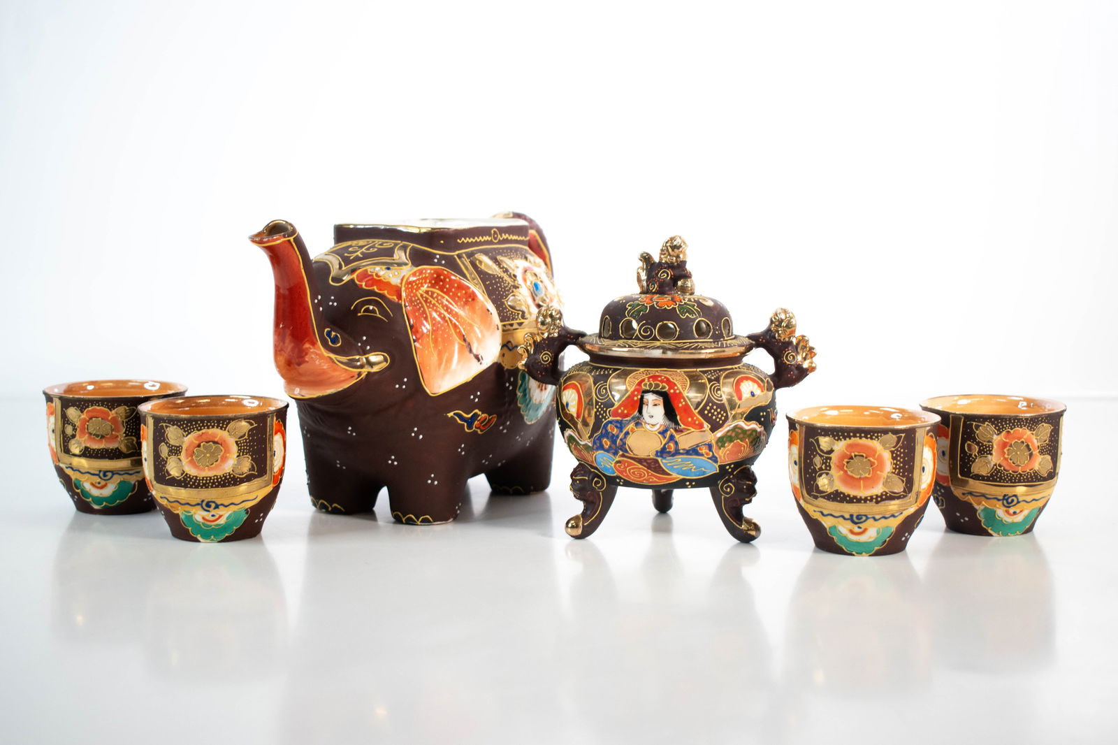 Japanese Satsuma Porcelain Collection: Nice collection some in unusual forms. Largest item height 9" ****We Offer In-House Shipping***