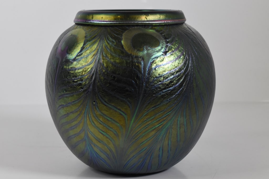 Charles Lotton Art Glass Peacock Vase (Born 1935): A fine art glass vase signed Charles Lotton, 1935-2021 Elizabethtown, IL in the more rare Peacock feather design with an iridescent finish Approximately 8"H