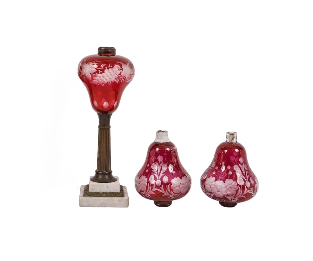 Antique Cranberry Glass Oil Lamps: Includes (3) cranberry glass oil lamps, late 19th c.,with brass and marble base; together with two cranberry glass fonts. Tallest: measures approx. 14.5"h