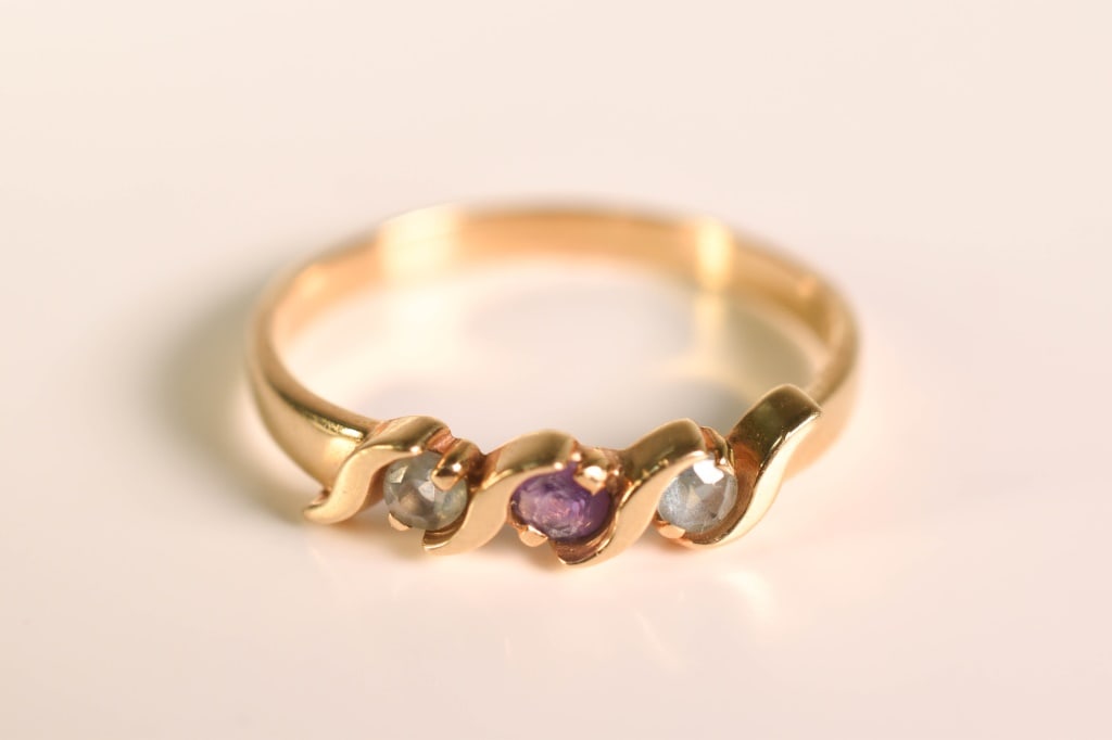 14K Gold, Amethyst & Glass Ring 2.69 Grams: two stones are pale blue glass, one 3mm diameter amethyst (low quality)