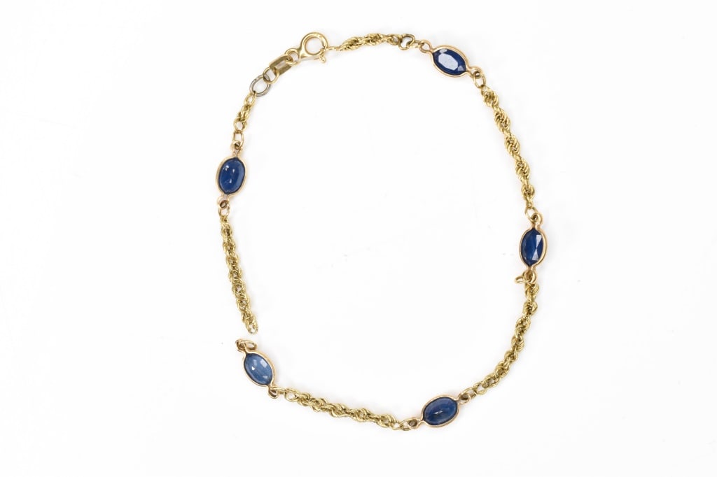 14K Gold & Sapphire Bracelet: needs repair - 14K, 5 oval blue sapphires, apx 5mm x 3mm oval