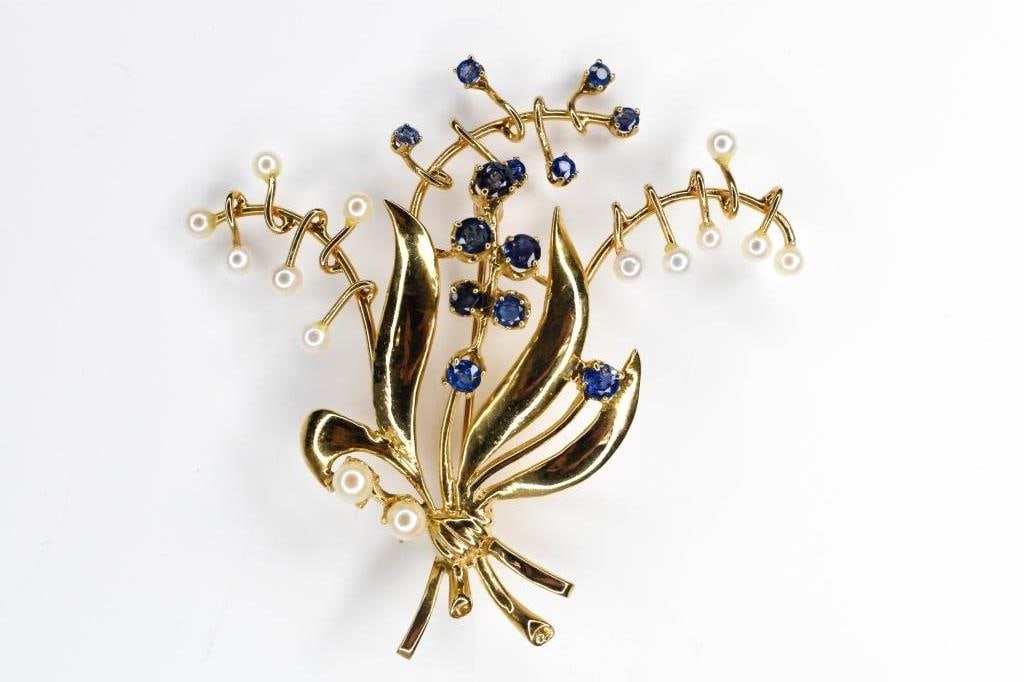 14K Gold, Sapphire Floral Sprig Brooch 6.07 DWT: Equisit14K yellow gold containing blue sapphires: (7) approx. 3mm, (6) approx. 2mm; along with 14 small pearls, 6.07 dwt