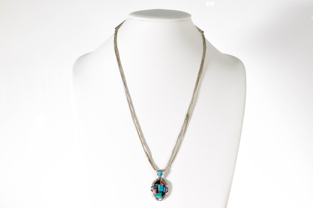 Sterling Liquid Silver Chain with Inlaid Pendant: Sterling 10 strand 20" liquid silver necklace with extention chain; Pendant inlaid with turquoise, coral, malachite, and black onyx, 0.643 ozt.