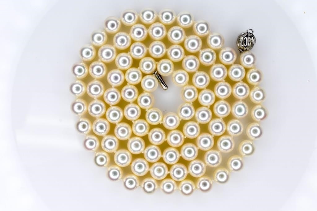 Pearl Necklace with 14K White Gold & Diamond Clasp: Includes one (1) 35 ½” Cultured Pearl Necklace with 14K White Gold Diamond Bead Style Clasp. This strand consists of ninety round cultured pearls which are strung on white cord with knots