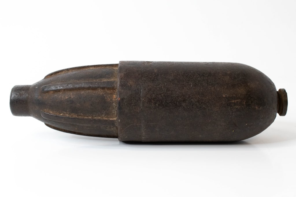 Civil War Era Schenkl Artillery Projectile: Screw in brass fuse is marked J P Schenkl pat Oct 10 1861. Diameter is roughly 3 inches. Length is close to 12 inches. Projectile is cast iron. No history is available on it. Provenance: Acquired from