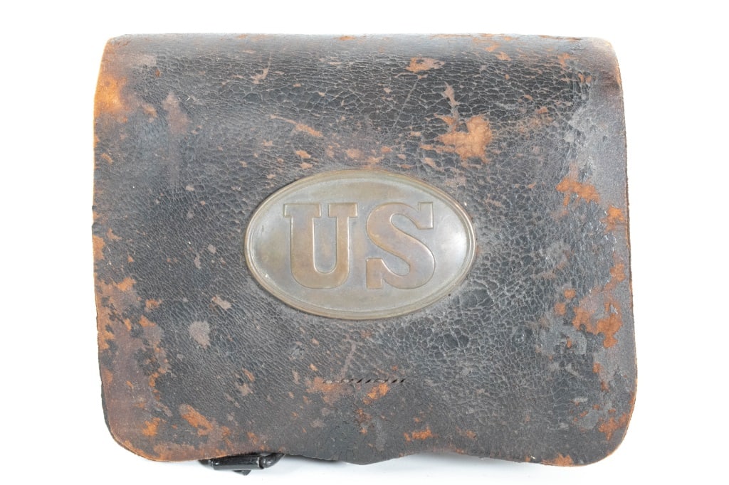 Civil War Union Model 1857 Cartridge Box: Made by Sterling & Co St Louis. Both buckles are on the bottom. Letters straps on the back are there. Smaller leather flap needs to be reattached. Leather shows crackling and wear. US union brass plat
