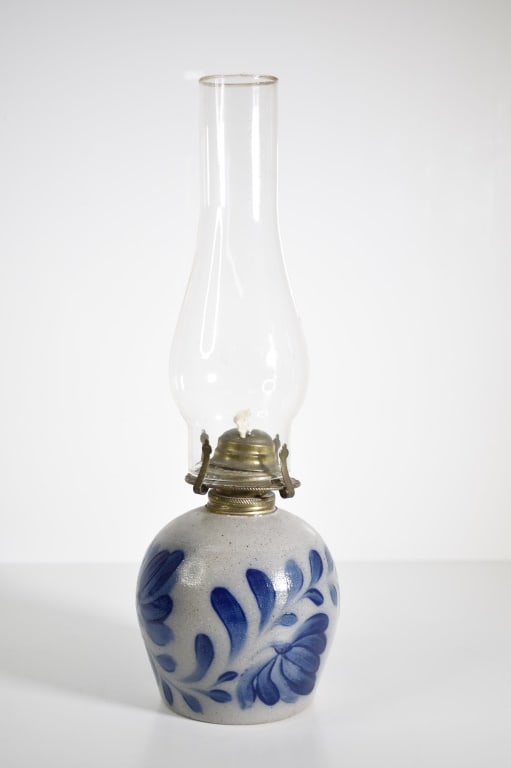Modern Blue Devorated Stoneware Lamp: Signed in blue af or nf. Base of the handle has a stamp mark. Nice dark blue on it. Don't see any chips or cracks on it. Needs fluid. Being sold untested. Provenance: Acquired from a single owner priv