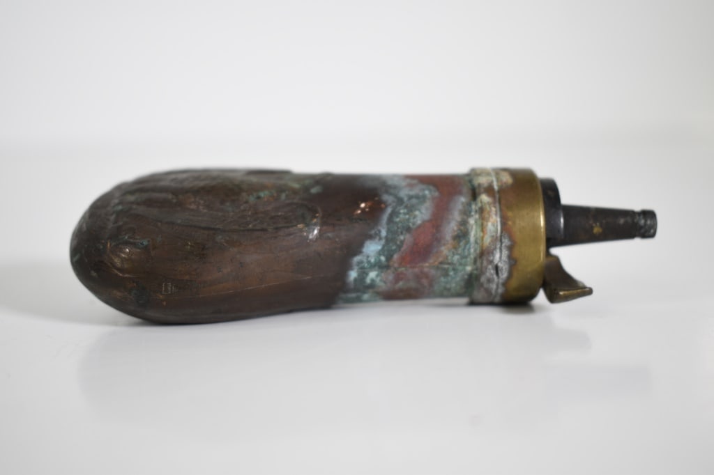 Antique Brass Eagle Shot Powder Flask: No markings. Some oxidation. 4.25 inches long. 1 side has a slight separation to it. Provenance: Acquired from a single owner private estate collection originating in Gettysburg, Pennsylvania. The col