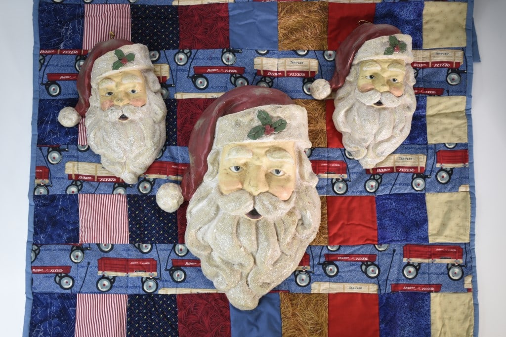 3 Santa Claus Wall Hanging Heads: Made out of a plaster like molded like material. Not a blow mold. Largest 1 is18 inches long. Provenance: Acquired from a single owner private estate collection originating in Gettysburg, Pennsylvania