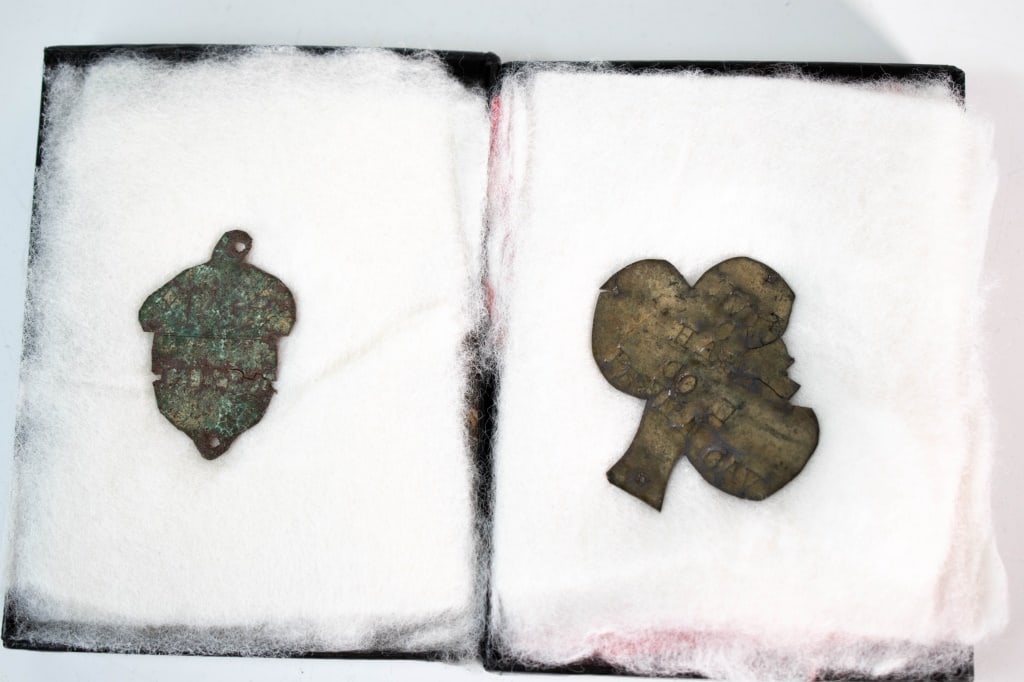 Civil War Tin Tags: Spade is for Pvt C Hall Co E Penna Cav. 1.75 inches long. Some damage to the top right area. Other is a acorn shaped piece of tin stamped 14th corps. No info is available on where they were found. Bot