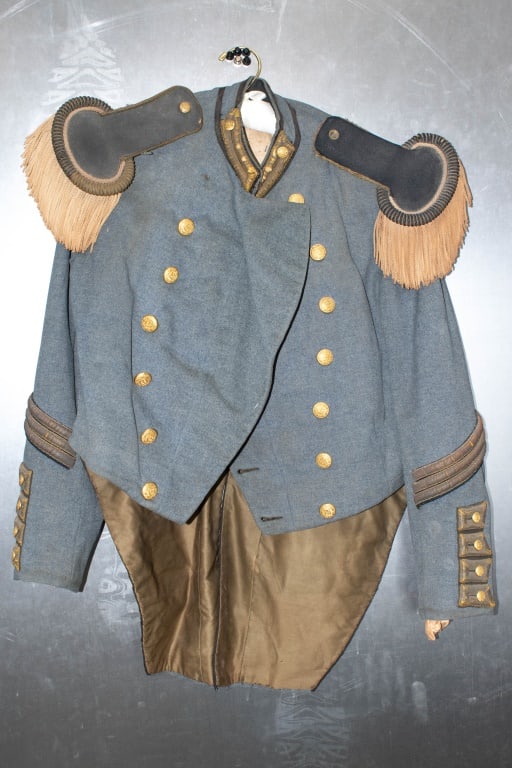 1800s Cleveland Greys Militia Uniform: 13 buttons on the front. Top right chest area button is missing. Left shoulderboard is missing the button. Right shoulder board bracket needs to be sewn on securely. Bullion on the patches on the coll