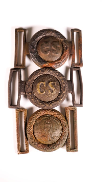 Civil War Two Piece Belt Buckles (Three Sets): Rough castings. The native American is 2.5 inches long when together. Provenance: Acquired from a single owner private estate collection originating in Gettysburg, Pennsylvania. The collection was car
