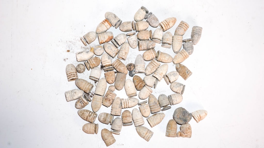Dug Rifle Civil War Bullets: Can is about 1/3 full. Bullets are 0.75 to an inch long. No info is known on where they came from. Provenance: Acquired from a single owner private estate collection originating in Gettysburg,