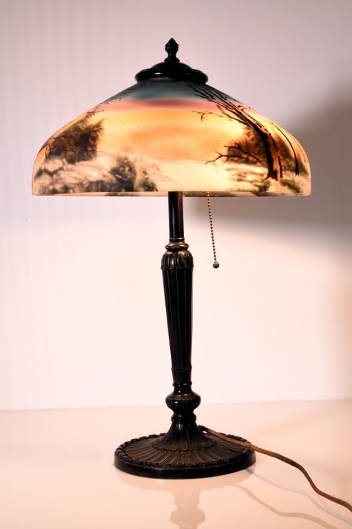 Reverse Painted Glass Shade: Glass shade featuring a hand-painted landscape with trees and a gradient sunset. Includes a central mounting hole for installation and a decorative central finial. Designed for overhead lighting