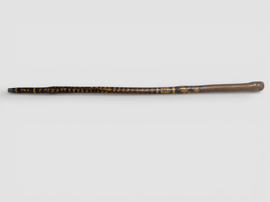 Decorated Walking Stick with Unique Pattern: Wood cane measuring 34 inches in height featuring ornate burnt-style patterns across its shaft. Accents include detailed decorative banding and a natural, polished wood handle. The intricate design of