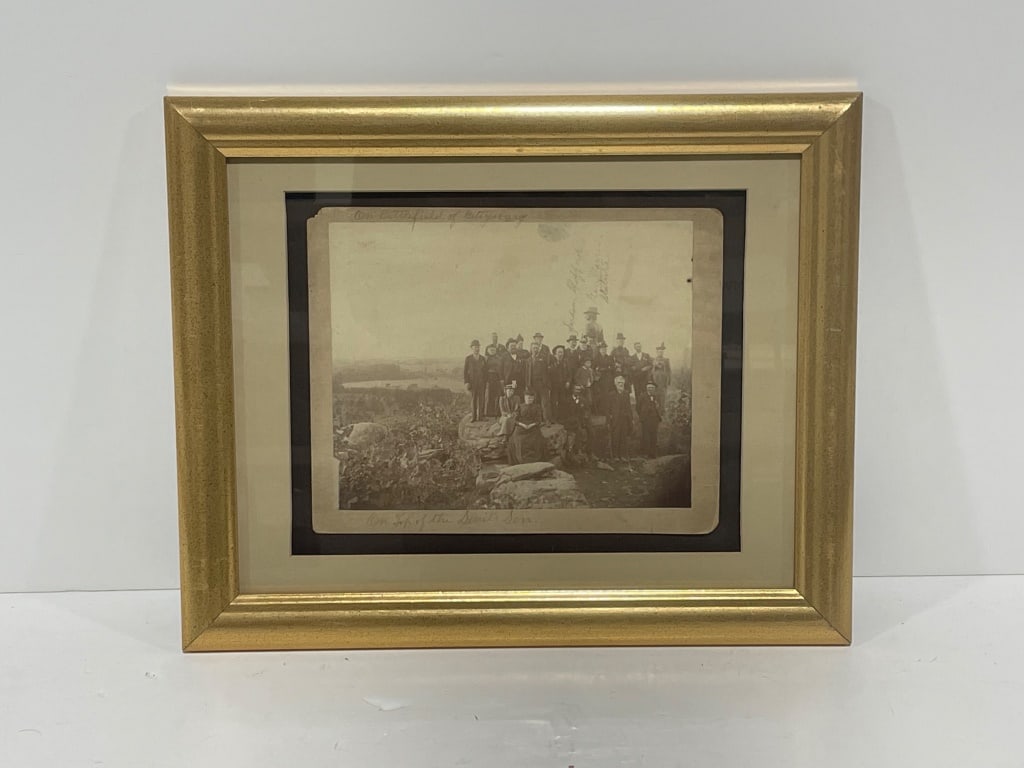 Levi Mumper Civil War Reunion Photo 1888 (Musuem): Framed photograph by Levi Mumper depicting Civil War veterans and families at Little Round Top, Gettysburg. Image includes the statue of Major General Gouverneur K. Warren, unveiled in 1888,
