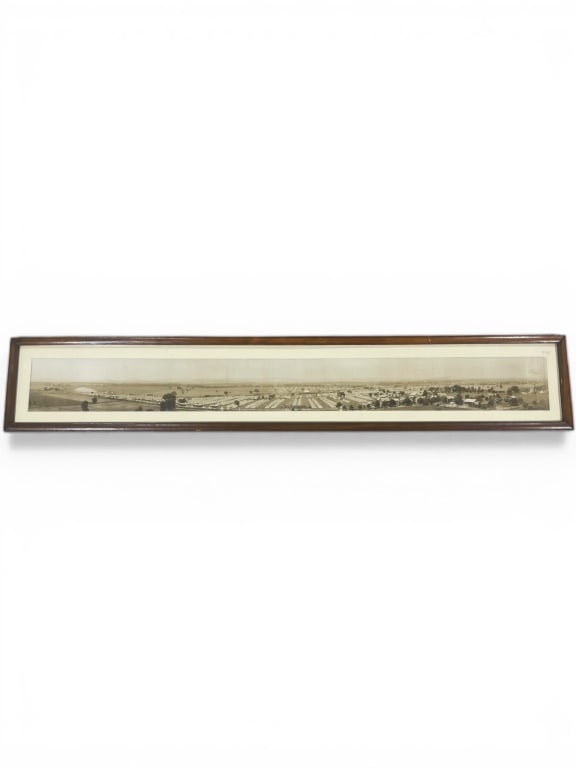 Early Panoramic Civil War Re-Union Photograph: Panoramic photograph featuring a rural landscape with fields and structures, housed in a rectangular frame with a wood border. The dimensions are approximately 62 inches wide by 11 inches high,