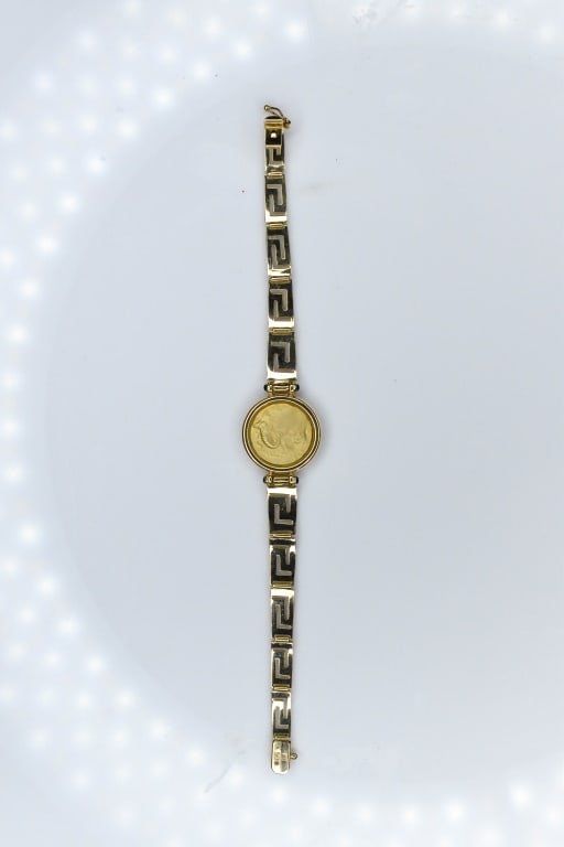 Ladies Alexander 18K Bracelet 20.66g: This ladies Alexander 18k gold bracelet measures approximately 7.5" in length when unclasped.