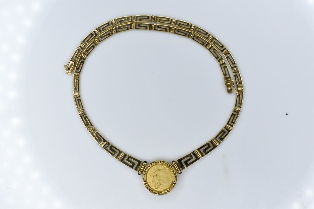 Ladies Alexander 18K Necklace 34.78g: This ladies Alexander 18k gold necklace measures approximately 16" in length when unclasped.