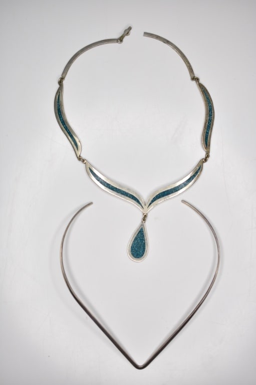 Native American Style Sterling Necklaces 1.5ozt: There are two pieces included in this lot. The blue necklace measures approximately 15.5"l and the plain silver piece measures approximately 5.5"l. Combined weight is approximately 1.5ozt including in