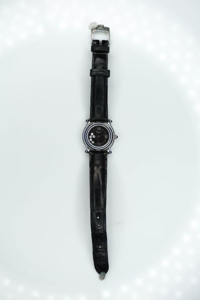 Chopard Happy Sport Diamond Watch: Diamond and steel watch #2718245-23 684201 8425. Including the watch bands, this item measures approximately 8"l.