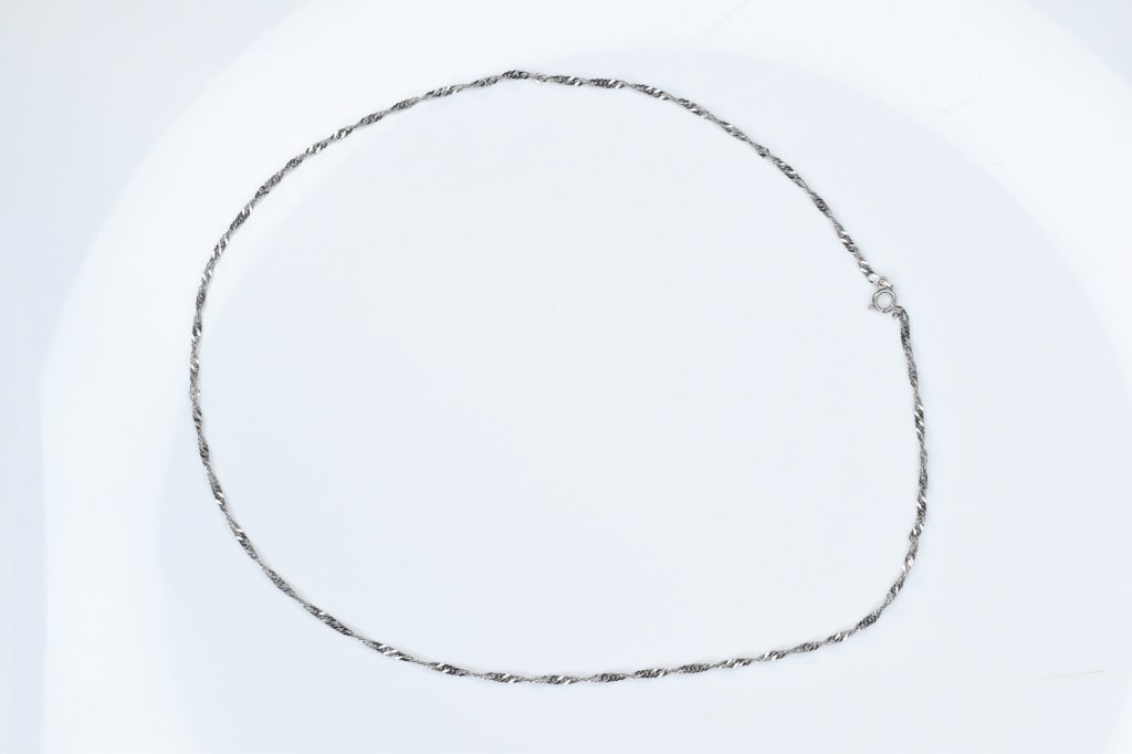 14K White Gold Necklace 3.14g: White gold needs loop at end for clasp marked 585 measuring approximately 18.5"l.