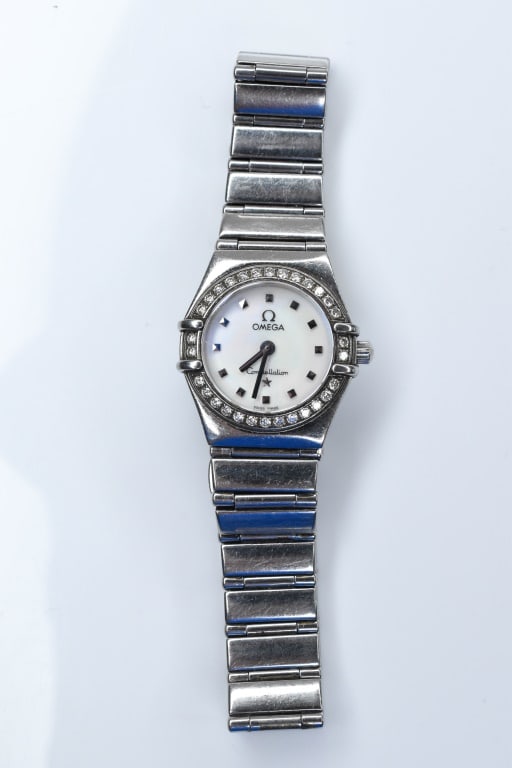 Omega Constellation Ladies Diamond Watch: .5 CTTW of diamond rounds 1.5 mm stones.Saphire crystal, made in Switzerland #56793186. The watch measures approximately 3.5"l while clasped.
