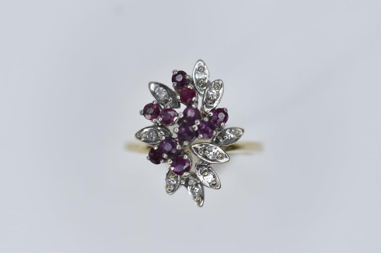 Diamond and Spinal 14k gold ring 5.12g: Ring is an approx. size 7 3/4 and weight of 5.12g. Diamond and Spinal 14k gold ring includes 9 diamonds, 10 faceted spinals diamond approx. .27 carat spinals approx. .50 CT floral cluster yellow sm di