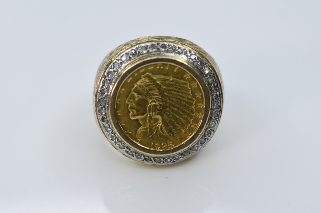 14k Indianhead 2.5 dollar Dollar Gold Ring 28.9g: Ring size is approx. 9.5 and 28.9grams in weight. 14k Gold Coin Ring set in 14k yellow gold is a 1925 Indianhead 2 1/2 dollar gold piece surrounded by approx. 35 1/50ct full cut diamonds tcw approx. .