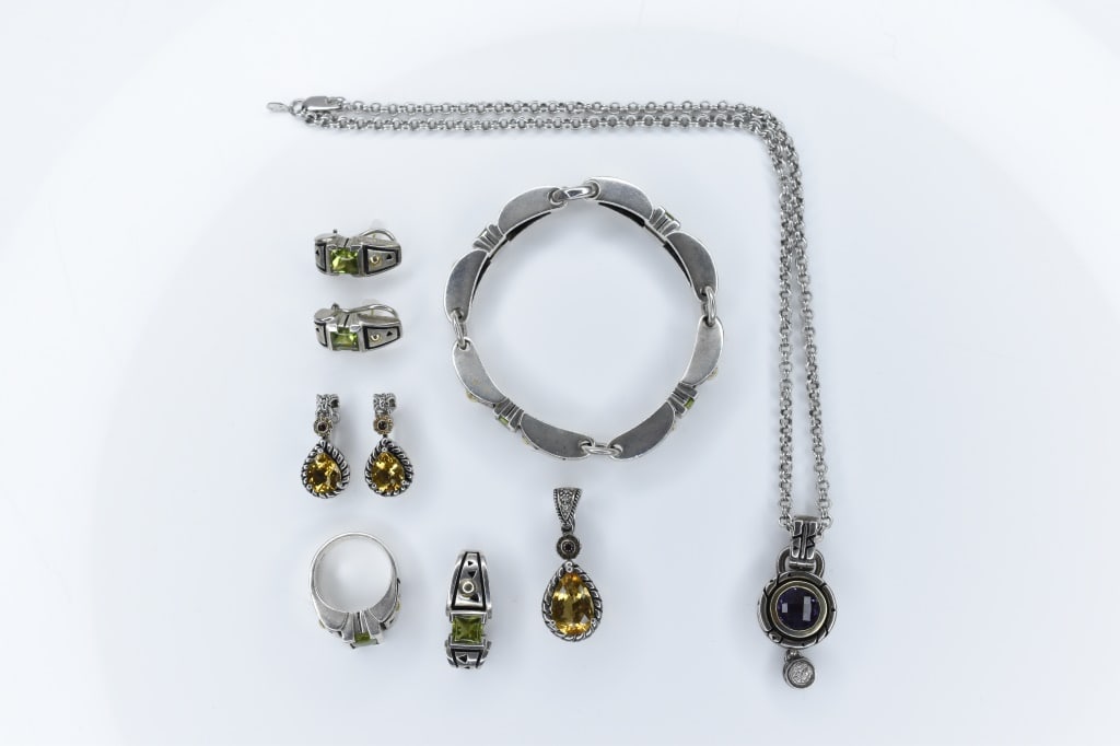 Costume Jewelry: Lot includes earrings, rings, bracelet, and pendant set with tourmaline citrine amethyst 14 ct, 18 ct , and sterling