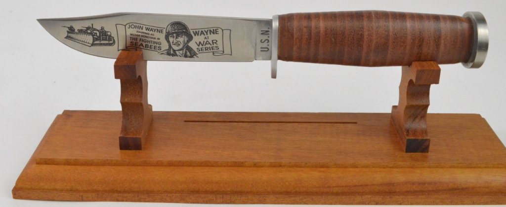 John Wayne at War Knife: John Wayne at War Commemorative Knife. The Fighting Seabees in original box. 9 overall stand/display not included"