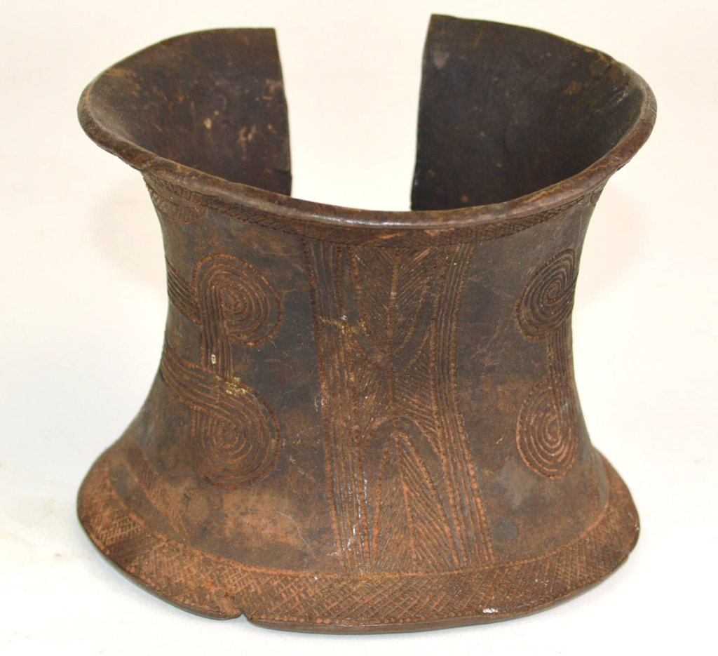 African Bronze Archer's Cuff Or Currency: Antique, with incised decoration. Measures 3.5 h x 4.75 O.D"