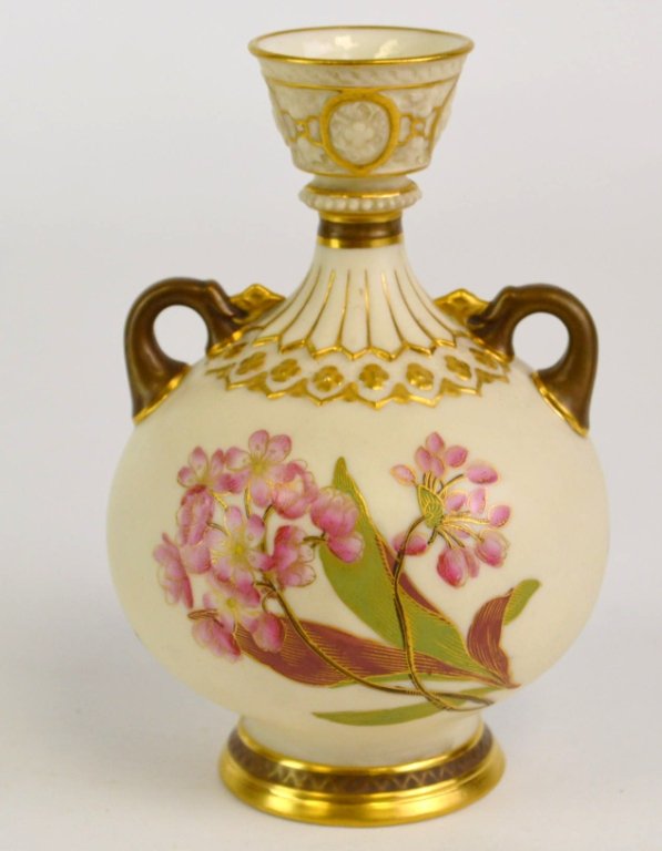 Royal Worcester Vase: 1887 Royal Worcester Double Handled Vase measures 6.25H x 4"w. No chips, cracks or crazing"