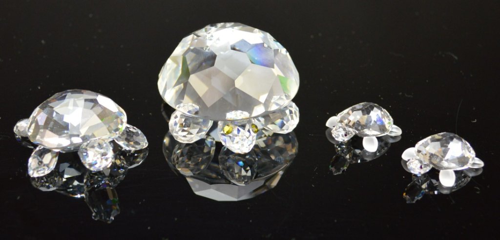 Swarovski Crystal Turtle Lot: Lot includes Large Turtle 7632 nr 045, measuring 2.75 x 1.75", no box. 7632 nr 000002 baby tortoises with frosted feet, measuring 1" with OB, and medium turtle 7632 nr 000001, measuring 1.75" with OB"