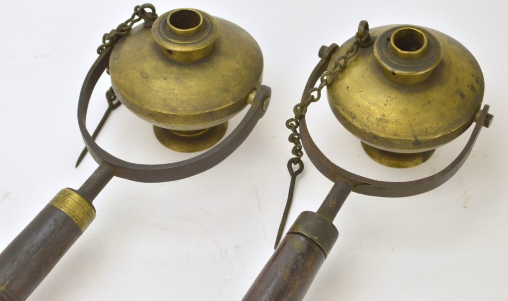 Pair of Antique Brass Hand Torches: 2 Antique Brass Hand Torches with Wood Handles and brass trim, measure approximately 22 in length"