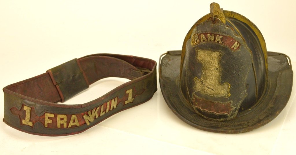 Wilson High Eagle Fireman's Helmet and Parade Belt: 19th Century Fireman's Helmet from Franklin Fire Co. Easton PA. with feathered Eagle finial and shield. Maker Wilson, has loss on both sides. Parade belt has a loose letter. Also has original buckle m